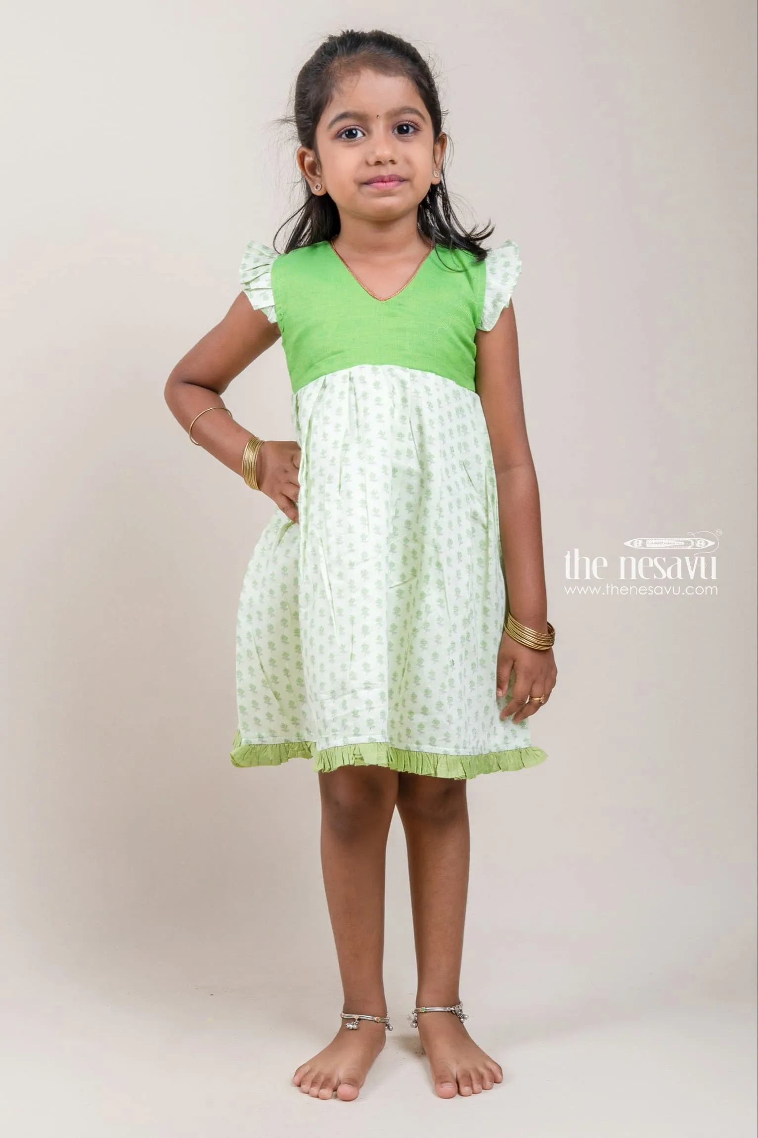 Charming Green Yoke And Small Butti Floral Printed Cotton Frock For Girls