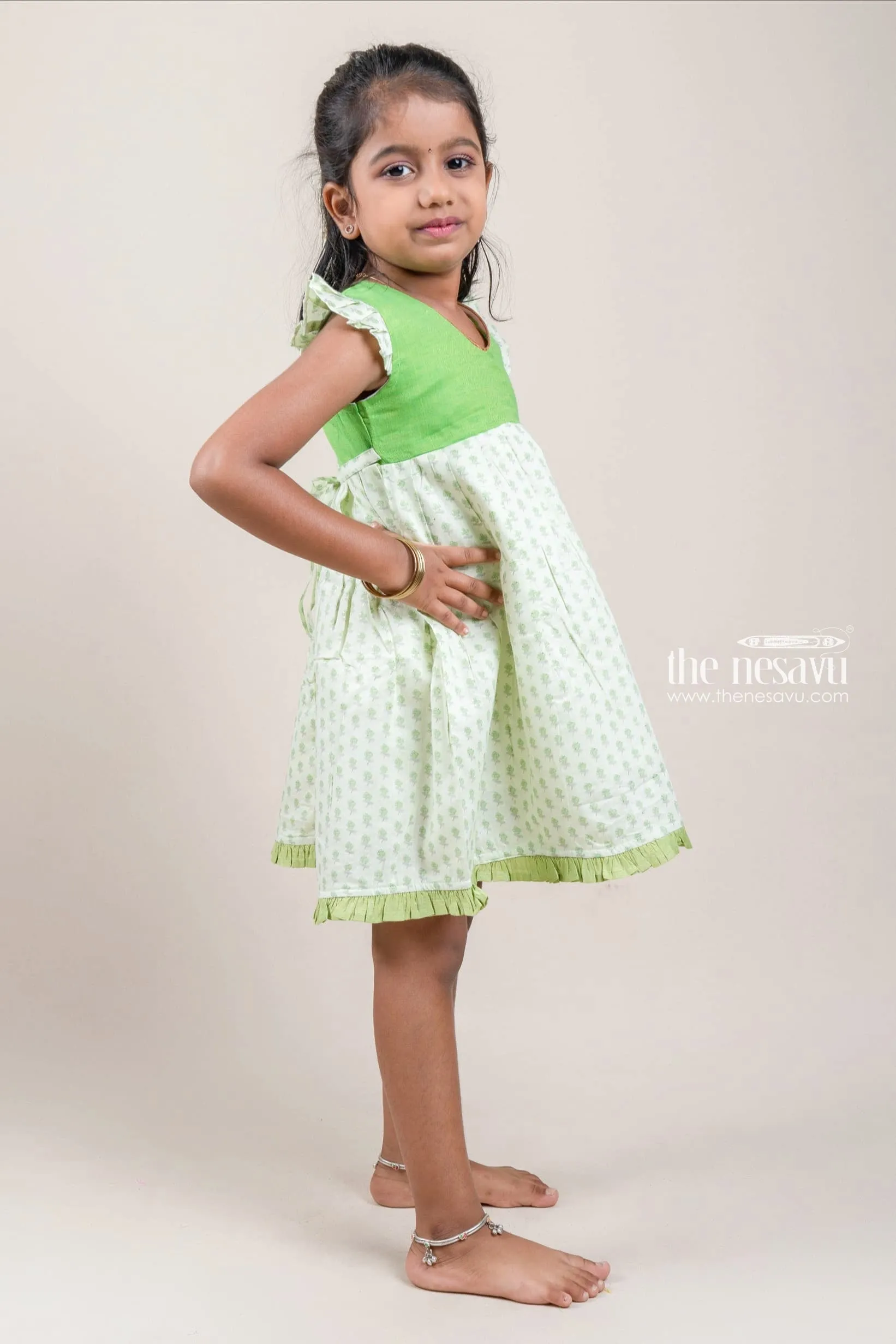 Charming Green Yoke And Small Butti Floral Printed Cotton Frock For Girls